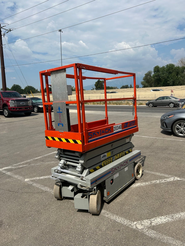 Quiet, zero-emission 19' electric slab scissor lift for narrow aisle access and indoor tasks.