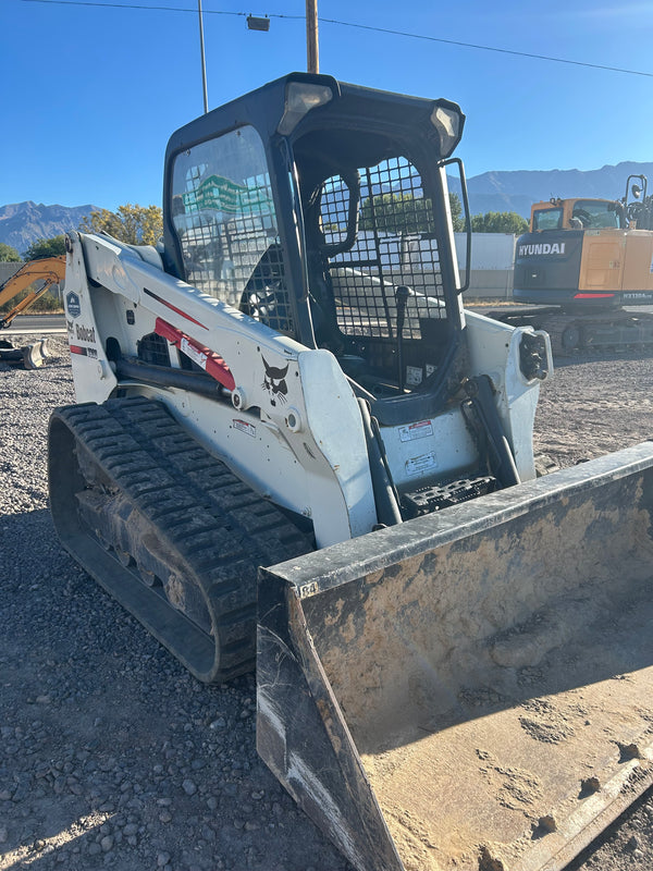 Rubble and debris from earthmoving work for a 2300 lb compact track loader.