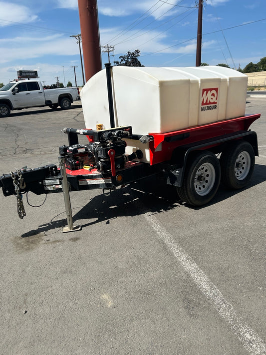 Towable 500-gallon water trailer used for jobsite dust control and compaction moisture.