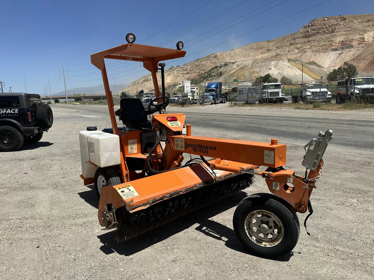 Powerful 3-wheel ride-on sweeper rental for high-productivity commercial cleaning.