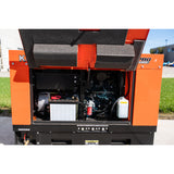 Kubota GL14000 generator with service doors open, showing the engine